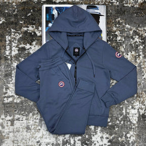 CNDA GOOSE TRACKSUIT-AAURE BLUE WITH RED BADGE