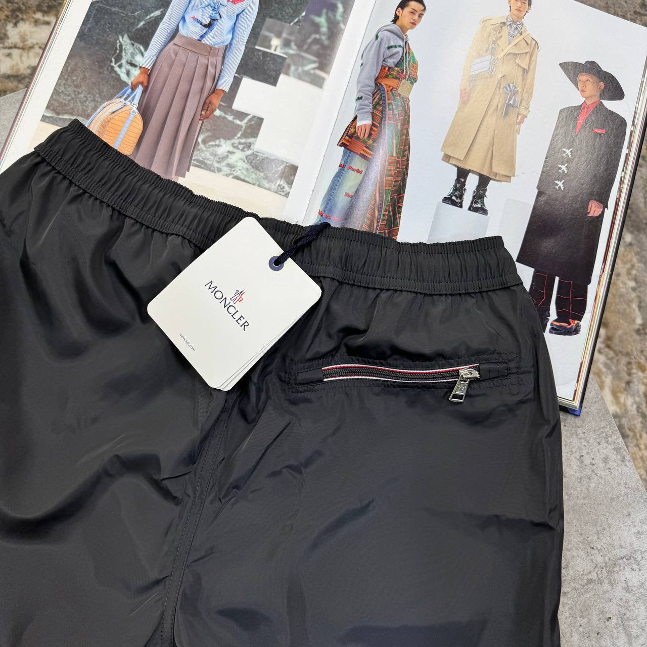 NCLR BACK ZIP SWIM SHORT ANTHERA