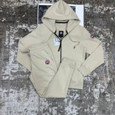 CANDA GOOSE TRACKSUIT BEIGE WITH RED BADGE