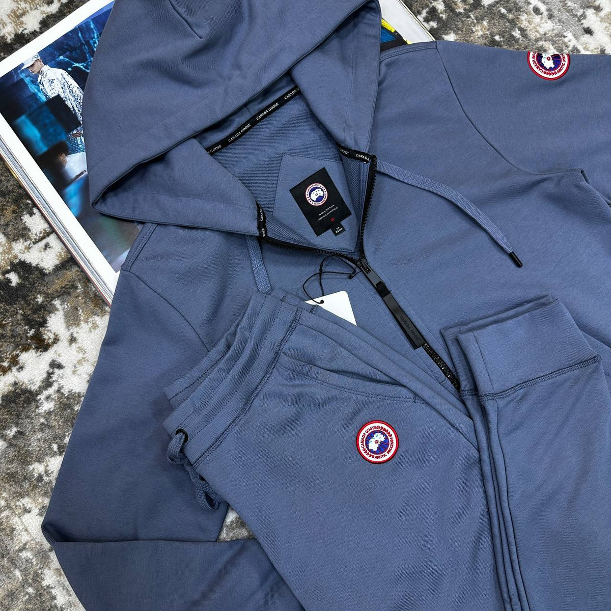 CNDA GOOSE TRACKSUIT-AAURE BLUE WITH RED BADGE