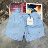 NCLR SIDE ZIP SWIM SHORTS LIGHT BLUE
